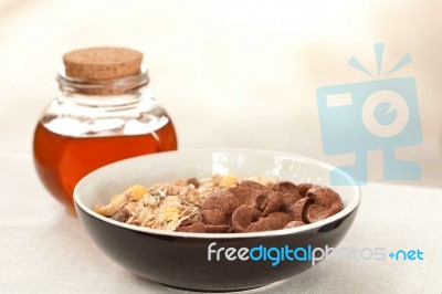 Crunchy Cereals With Honey Stock Photo