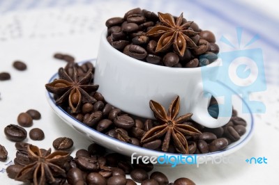 Cup Full Of Coffee Beans Stock Photo