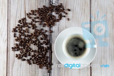 Cup Of Coffee And Coffee Beans Stock Photo