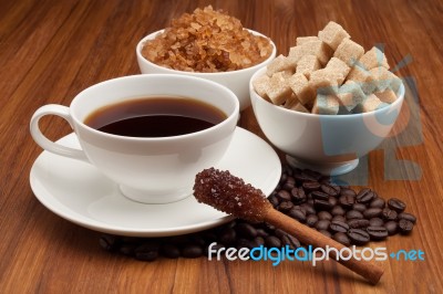 Cup Of Coffee And Sugar Cinnamon Stick Stock Photo