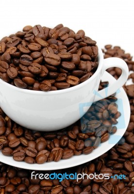 Cup Of Coffee Beans Stock Photo