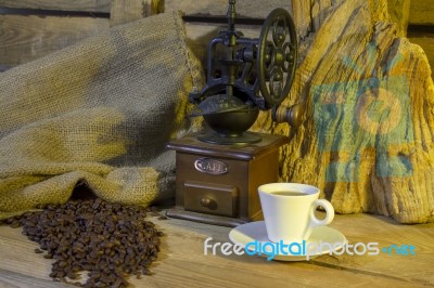 Cup Of Coffee, Coffee-beans, Coffee Grinder, Coffee Sack	 Stock Photo