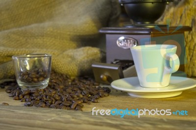 Cup Of Coffee, Coffee-beans, Coffee Grinder, Coffee Sack	 Stock Photo