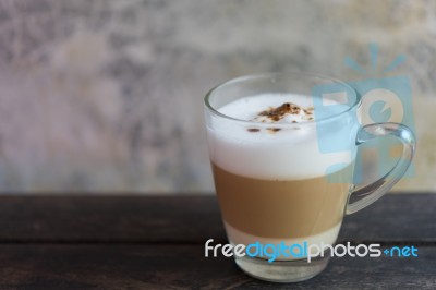 Cup Of Coffee Latte Art On Grunge Wood Table In Vintage Style Stock Photo