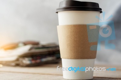 Cup Of Coffee On Desk Stock Photo