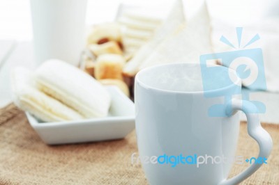 Cup Of Coffee On Table Stock Photo