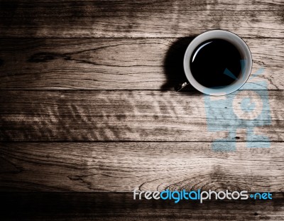 Cup Of Coffee On Wooden Table Stock Photo