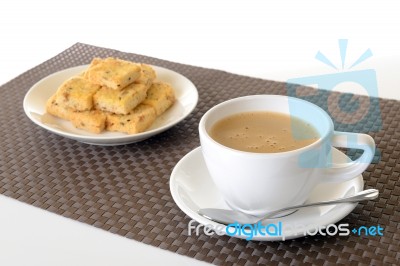Cup Of Hot Coffee And Biscuit Stock Photo