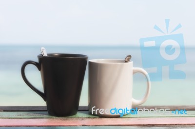 Cuple Of Coffee Cups In The Morning On Retro Terrace Facing Seas… Stock Photo