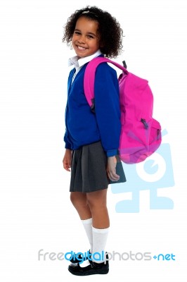 Curly Haired Elementary School Girl Stock Photo