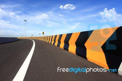 Curve Road And Blue Sky Stock Photo