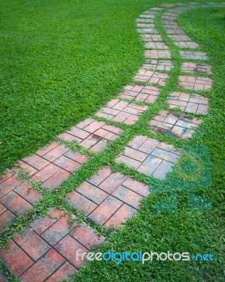 Curved Path On A Lawn Area Stock Photo