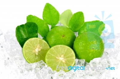 Cut Lime (citrus Aurantifolia (christm.)  Swingle) And Ice On Wh… Stock Photo