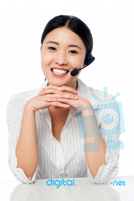 Cute Asian Female As Help Desk Operator Stock Photo
