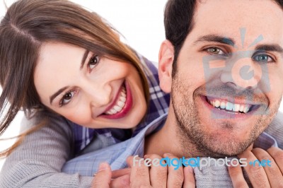 Cute Girl Holding Her Hands Round The Neck Of Her Boyfriend Stock Photo