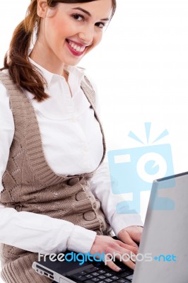 Cute Girl Typing On Laptop Stock Photo