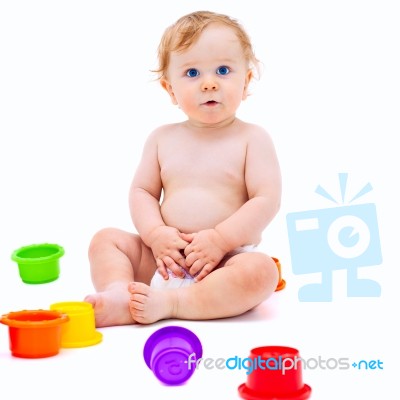 Cute Infant Boy With Toys Stock Photo