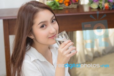 Cute Lady Drinking Pure Water Stock Photo