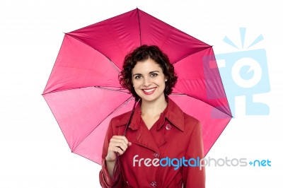 Cute Lady With An Umbrella On White Background Stock Photo