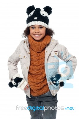 Cute Little Girl In Fashionable Warm Winter Clothes Stock Photo