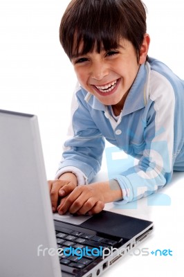 Cute Smiling Caucasian Kid With Laptop Stock Photo