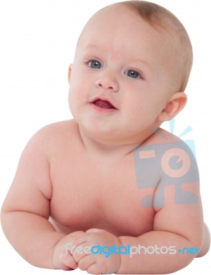 Cute Toddler Lying On His Tummy Stock Photo