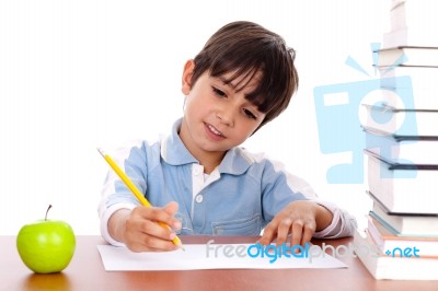 Cute Young Boy Busy In Drawing Stock Photo