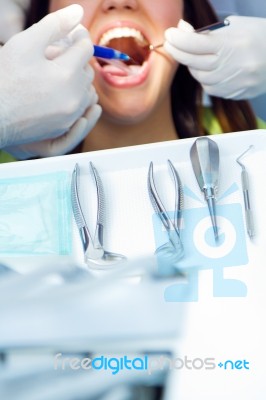 Cute Young Woman At The Dentist. Mouth Checkup Stock Photo