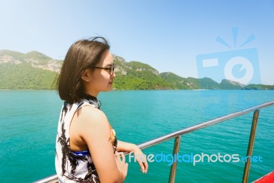 Cute Young Woman Under Sunlight Stock Photo