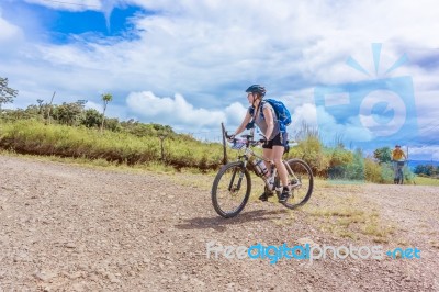 Cyclists On The Road In Costa Rica Near Tierras Morenas Stock Photo