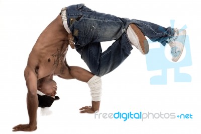 Dancer Balancing His Knees With His Elbows Stock Photo