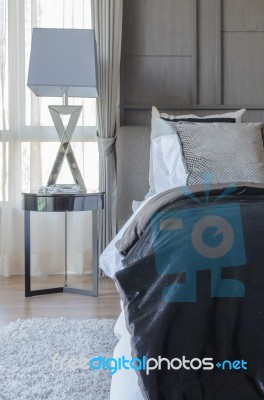 Dark Color Scheme Modern Bedroom Design With Pillows Stock Photo