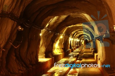 Dark Tunnel With Light Stock Photo