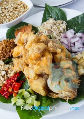 Deep Fried Fish With Herb Salad Stock Photo