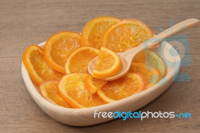 Dehydrated Dried Orange In Wooden Bowl Stock Photo