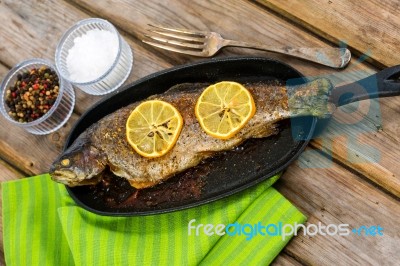 Delicious Baked Rainbow Trout With Lemon Straight From The Oven Stock Photo