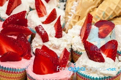 Delicious Vanilla Cupcake With Strawberry Frosting And Fresh Str… Stock Photo