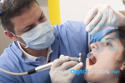 Dental Cleaning Close-up Stock Photo Dental Cleaning Close-up Stock Photo