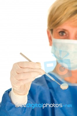 Dentist With Mirror Tool Stock Photo