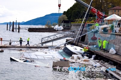 Destroyed  By Thunderstorm Piers With Boats In Verbania, Italy Stock Photo