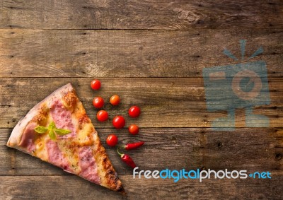 Diferents Types Of Pizza Cut On Wooden Table Stock Photo