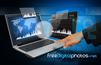 Digital Devices With Graph Report Stock Photo