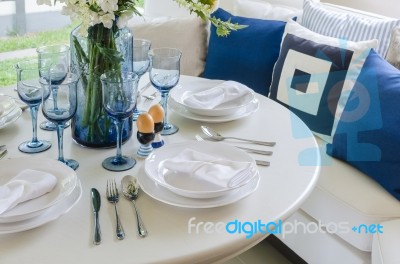 Dinning Room With White Round Table Stock Photo