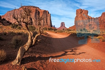 Dirt Road In Monument Valley Stock Photo Dirt Road In Monument Valley Stock Photo