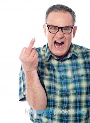 Displeased Man Shows Middle Finger Stock Photo