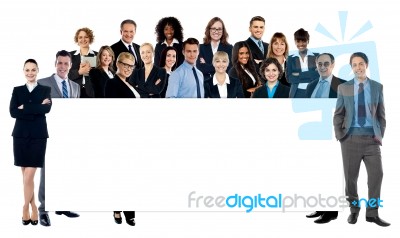 Diverse Business People Holding A Banner Stock Photo