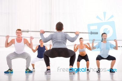 Diverse Group Of People Exercising In Gym Stock Photo
