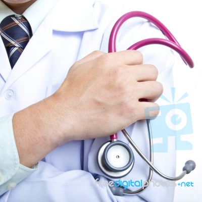 Doctor Holding Stethoscope Stock Photo