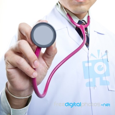 Doctor Holding Stethoscope Stock Photo