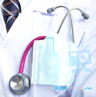 Doctor Holding Stethoscope Stock Photo